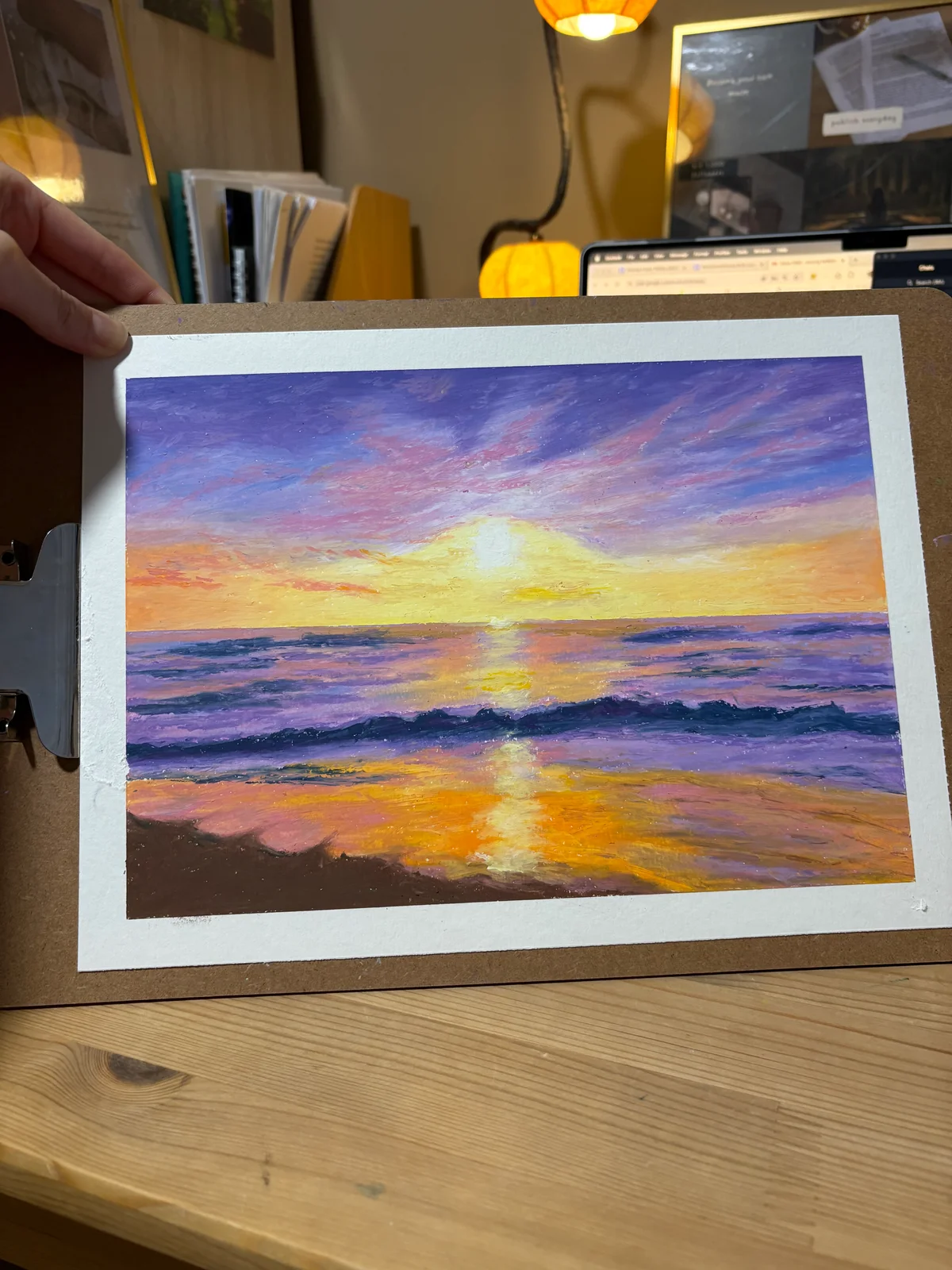 Painting of a golden sunset reflected on the sea beneath violet clouds.